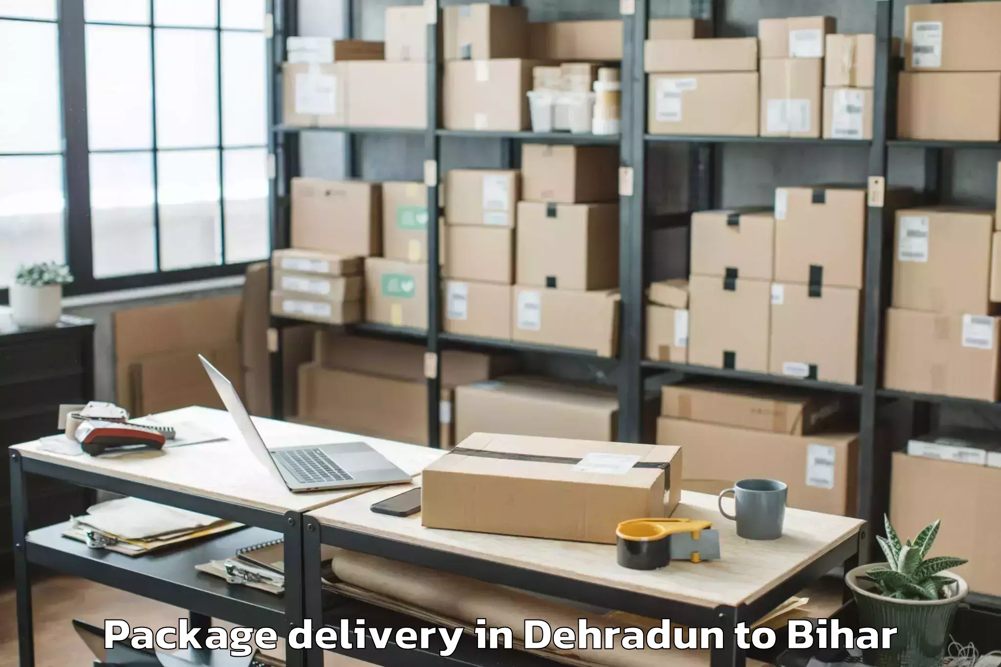 Quality Dehradun to Laukaha Package Delivery